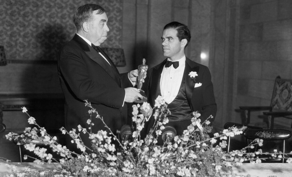 Frank Capra receives an Academy Award for Best Dorection in 1935 for It Happened One Night.