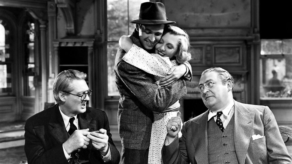 Lionel Barrymore, James Stewart, Jean Arthur and Edward Arnold in You Can't Take It With You (1938)